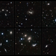 Illustration for article titled Galaxies are smashing into each other all over this cluster